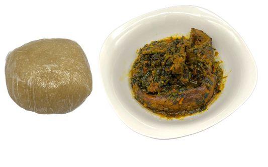 Eba (cassava grit fufu) with Efo riro (Vegetable Soup)